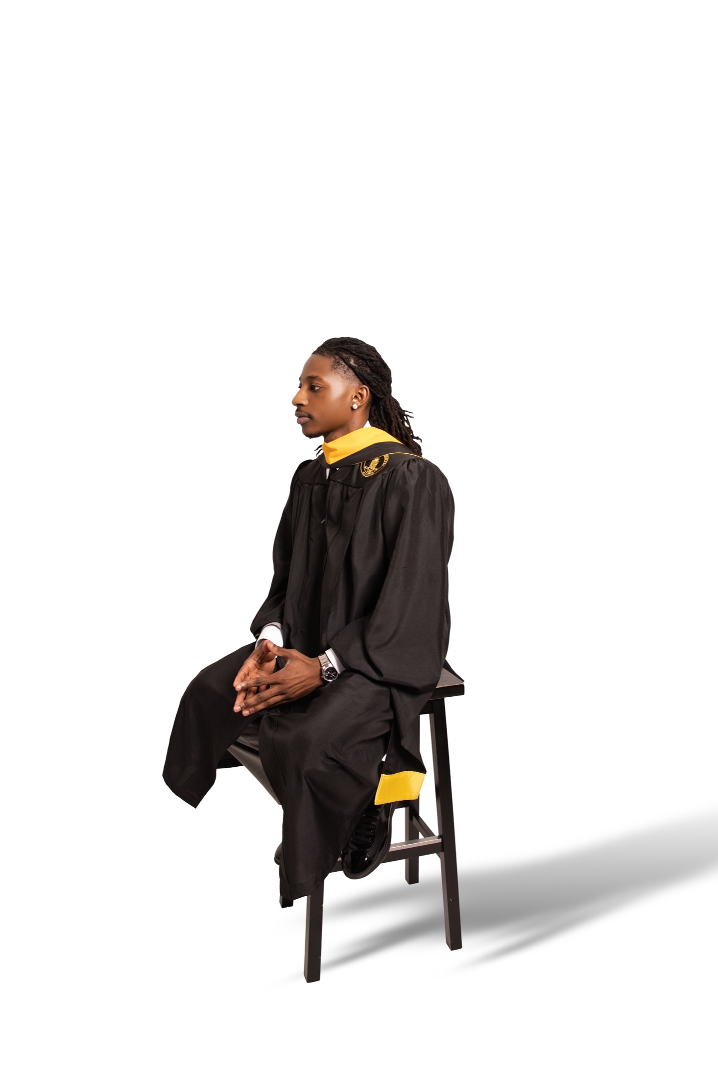 Studio graduation portrait in profile